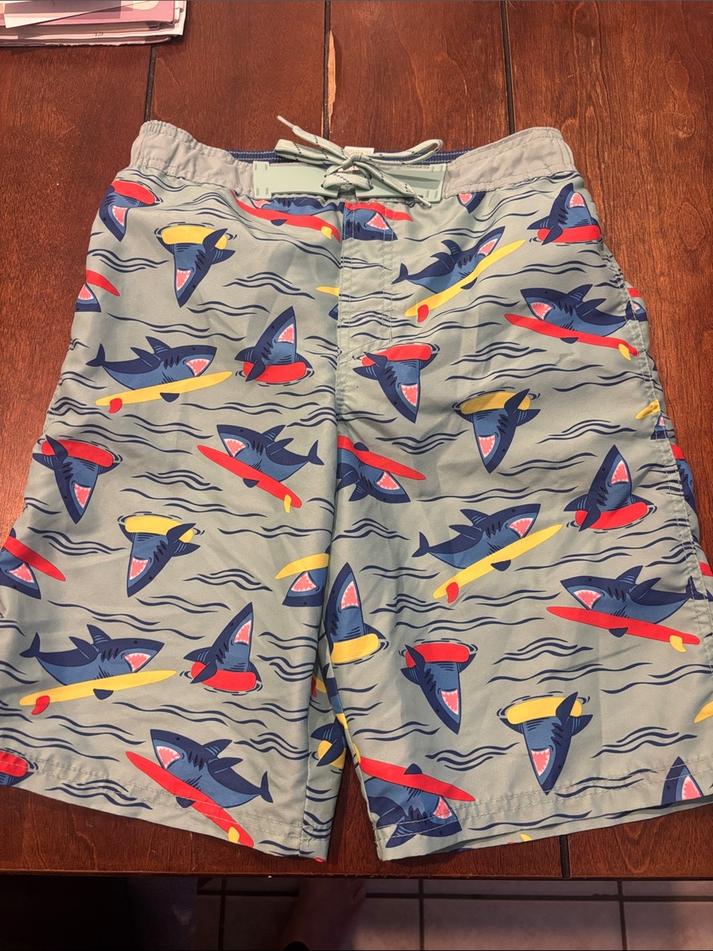 Cat & Jack Light Gray Swim Trunks with Surfing Shark Print